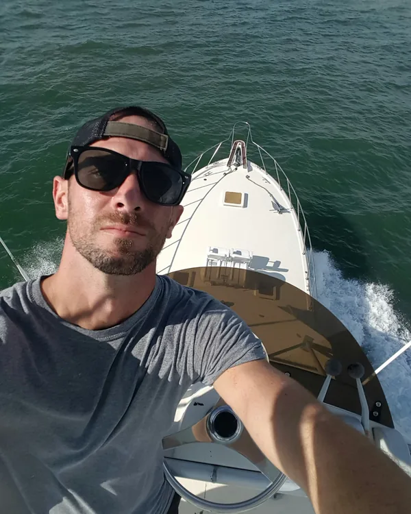 Captain Brian, an experienced freelance captain available for bareboat pontoon rentals out of Gulfport, Florida